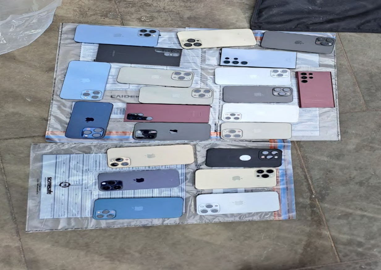 Phones stolen on the ground in an evidence bag
