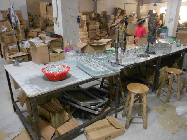Inside a counterfeit perfume factory 