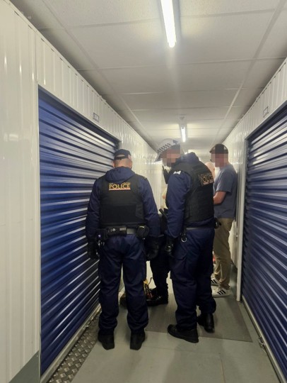 PIPCU officers during search warrant