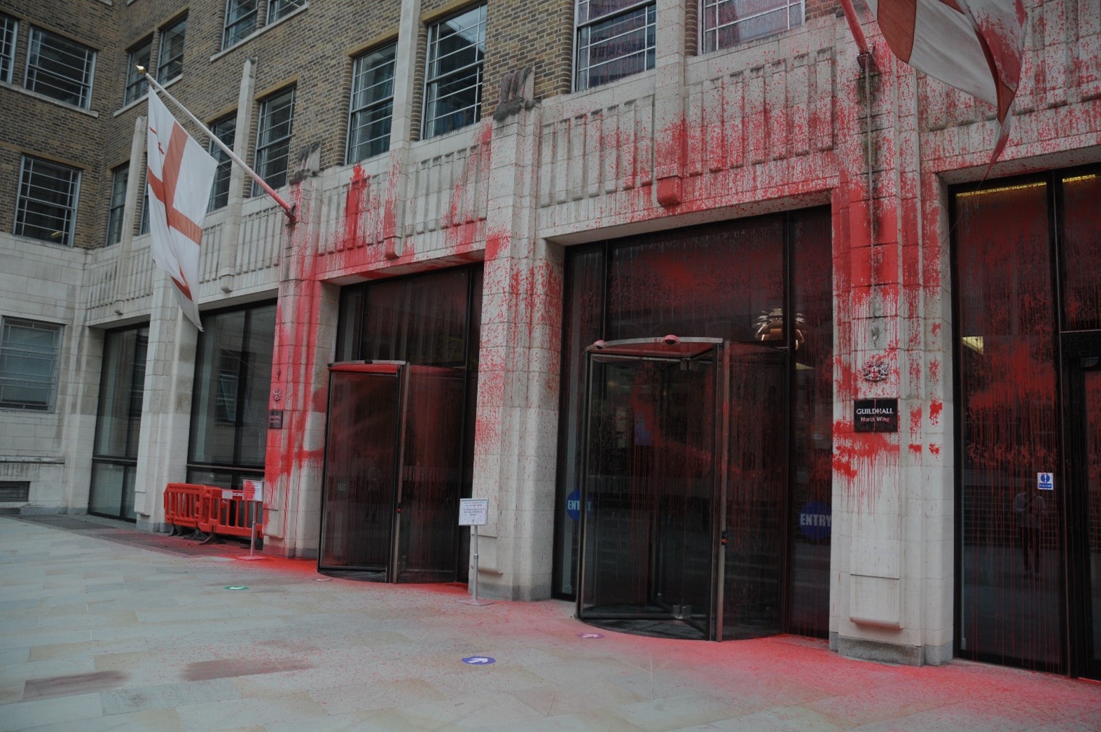 Guildhall with red paint over it