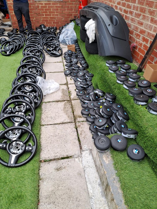 Counterfeit car parts on ground