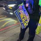 Photo showing sign with text NO INSURANCE SEIZED BY POLICE